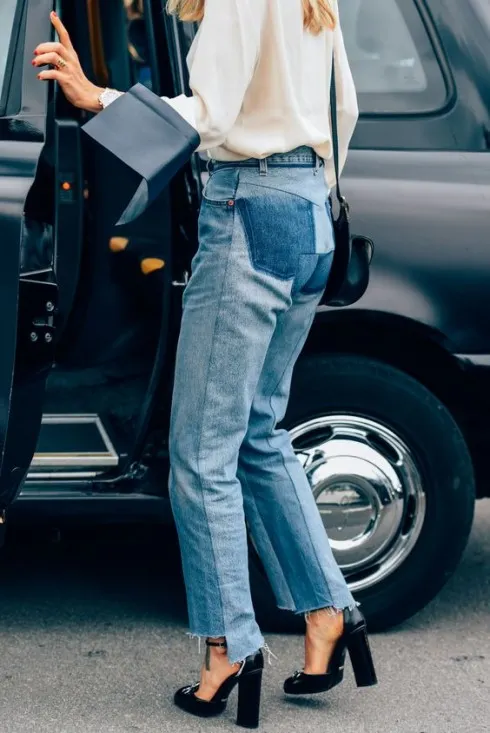 Jeans có gấu quần rách bất cân xứng mang đến điểm nhấn hay ho cho trang phục của người mặc.