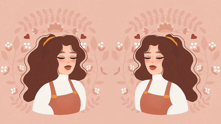 hai cô gái mặc yếm nâu đứng trước những đóa hoa