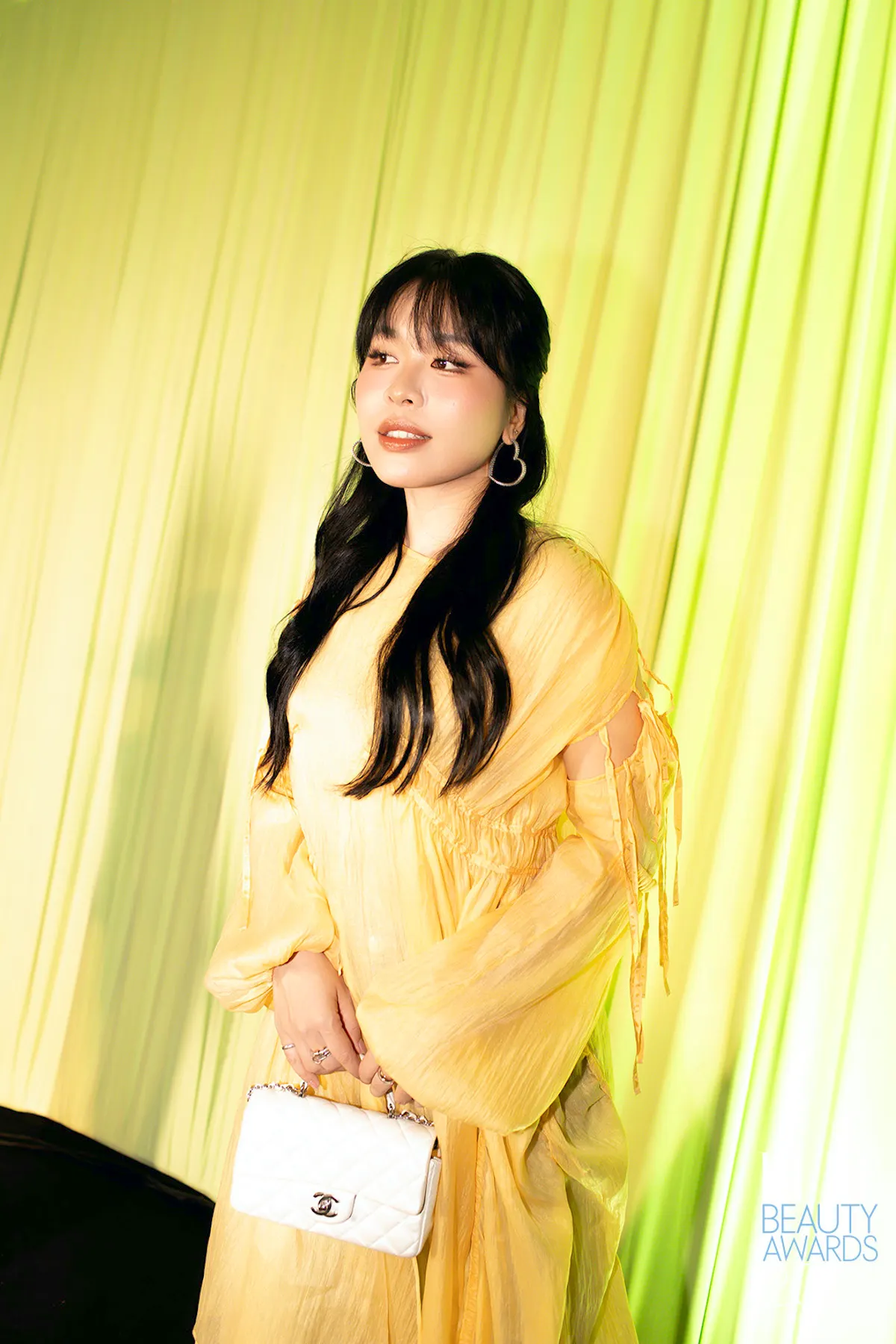 Beauty Blogger An Phương trong chiếc đầm vàng chanh tại ELLE Beauty Awards 2025