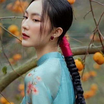 Gợi ý kiểu tóc đẹp mặc áo dài chụp hình.