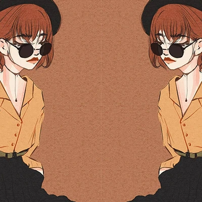 hai cô gái tóc ngắn ngồi đối diện nhau