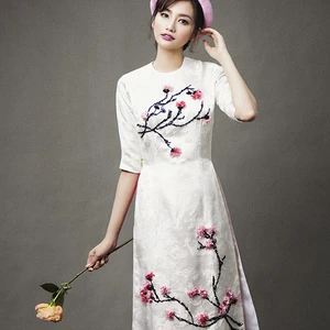 Mẫu áo dài cưới đẹp - áo dài tà lửng - elle vn