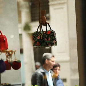 Coach mua lại Kate Spade
