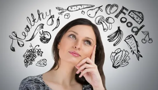 Young pretty woman thinking of healthy food closeup face portrai