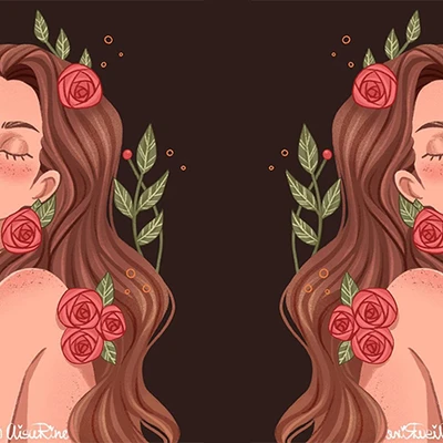 Hai cô gái tóc dài có cài bông đối lưng nhau