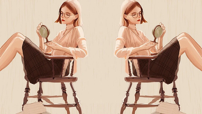 hai cô gái tóc ngắn đang ngồi trên ghế cầm quả địa cầu
