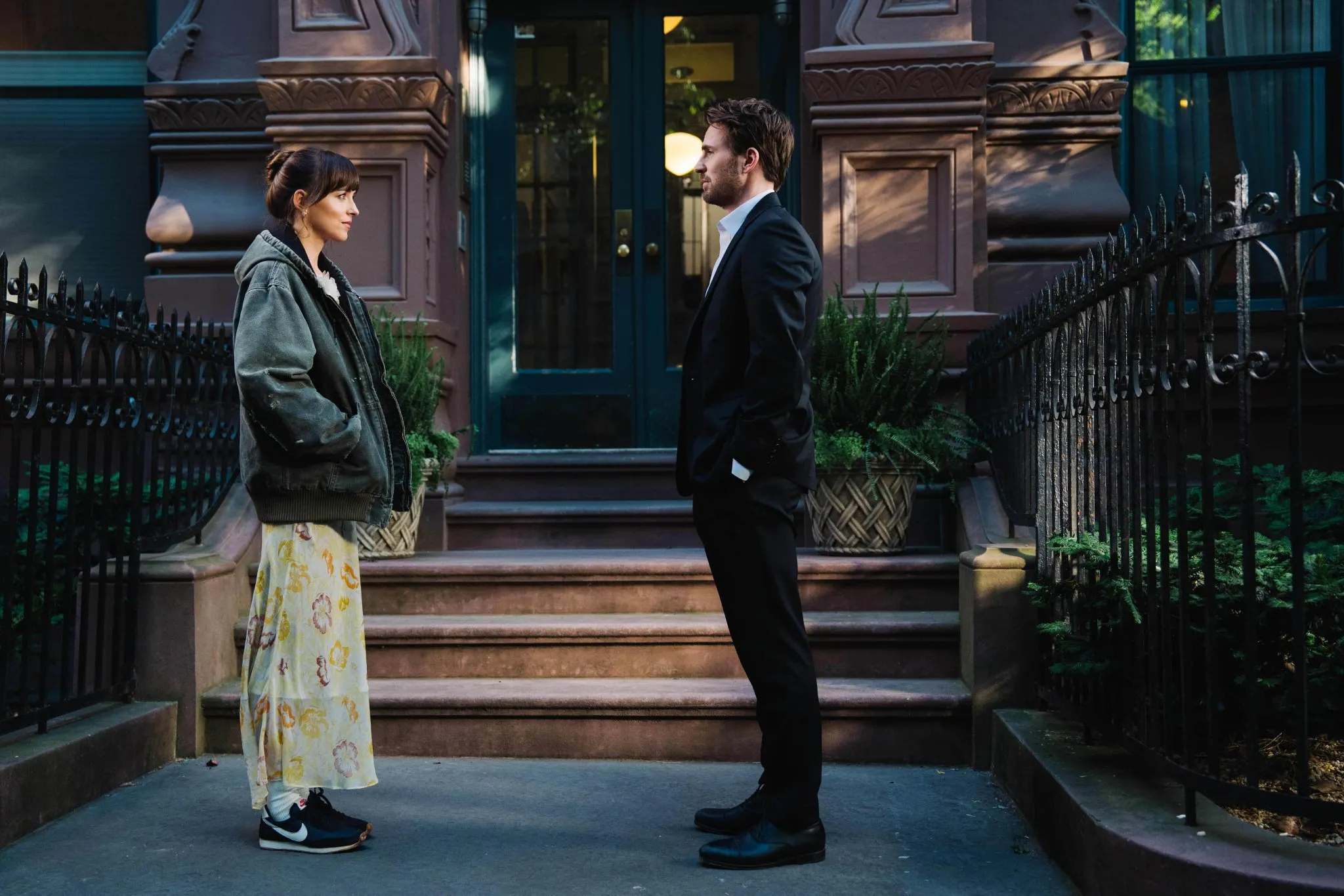 Dakota Johnson as Lucy and Chris Evans as John in Materialists 2025