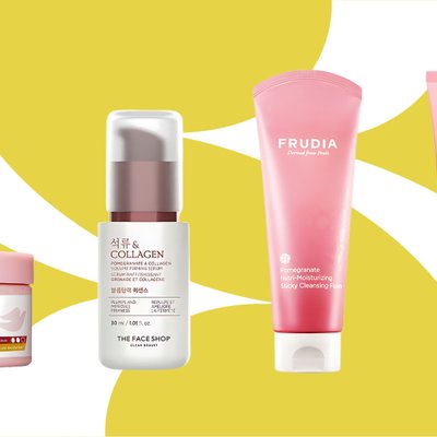 lựu đỏ - hũ tẩy tế bào chết body của Dove, chai serum của The Face Shop và hai tuýp sữa rửa mặt màu hồng của Frudia và Estee Lauder