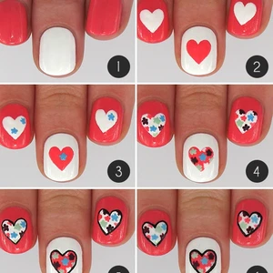 Đỏ - trắng kết hợp hình vẽ trái tim ngọt ngào sẽ là gợi ý sơn móng tay đẹp cho buổi hẹn hò của bạn.