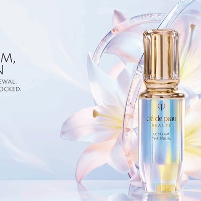 serum - chai serum màu hologram với nắp mạ vàng của thương hiệu Cle De Peau Beaute