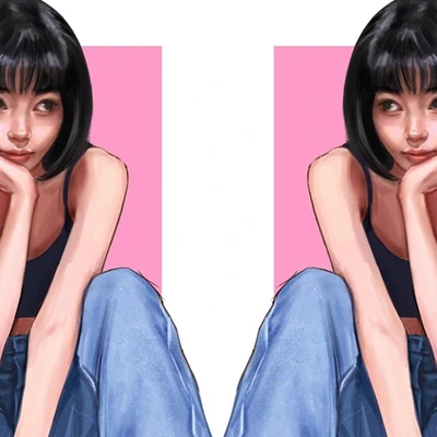 2 cô gái mặc quần jean đang ngồi