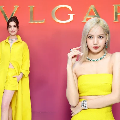 Anne Hathaway và Lisa cùng mặc trang phục màu vàng ở sự kiện Eden the Garden of Wonders của BVLGARI